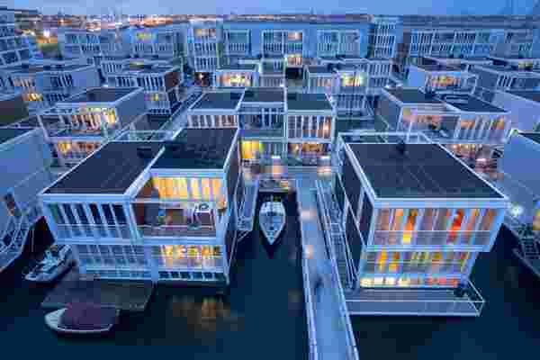 These floating homes in Amsterdam are designed to beat the rising sea levels and escape the growing city population