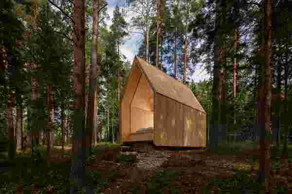 This sustainable cabin glows like a candle & was built using cross-laminated timber!